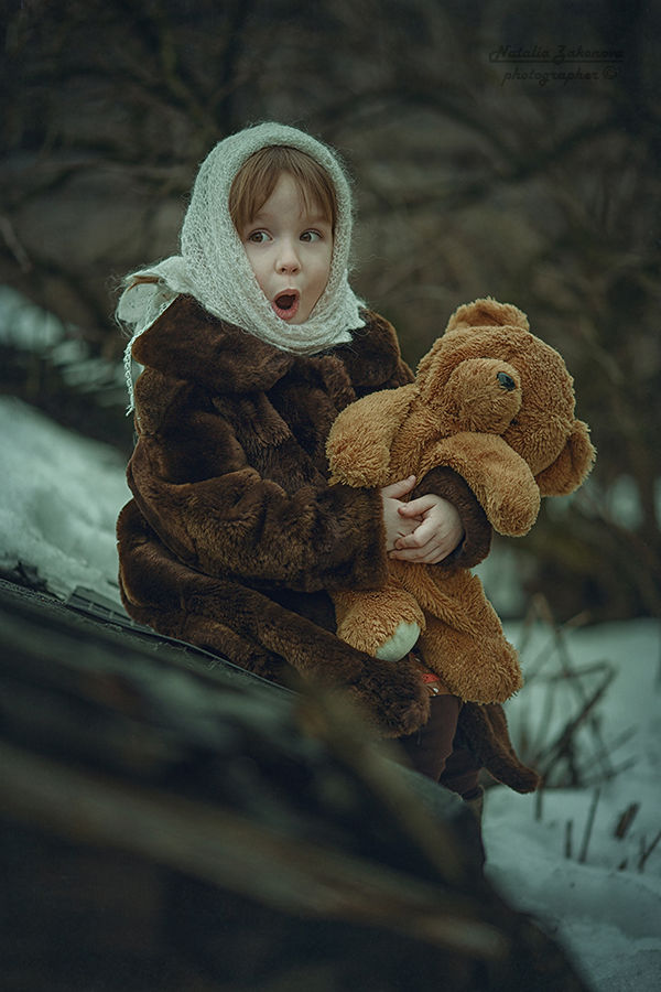 Ребенок в пуховом платке